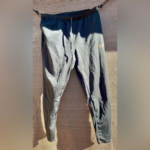 Nike Therma-FIT tapered training pants medium